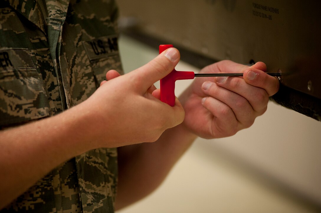 Senior Airman Derek Jaeger received the ACE award June 5, 2014. The ACE award is given for maintaining a 100 percent average. (U.S. Air Force photo by Airman 1st Class Jelani Gibson) 