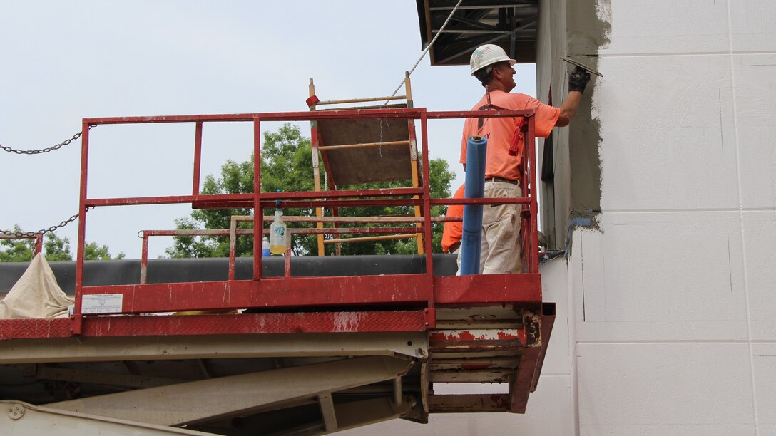 Construction on the 932nd Airlift Wing building expansion and elevator installation continues as temperatures at Scott Air Force base rise.  (U.S. Air Force Photo/Staff. Sgt. Meiko Schill)