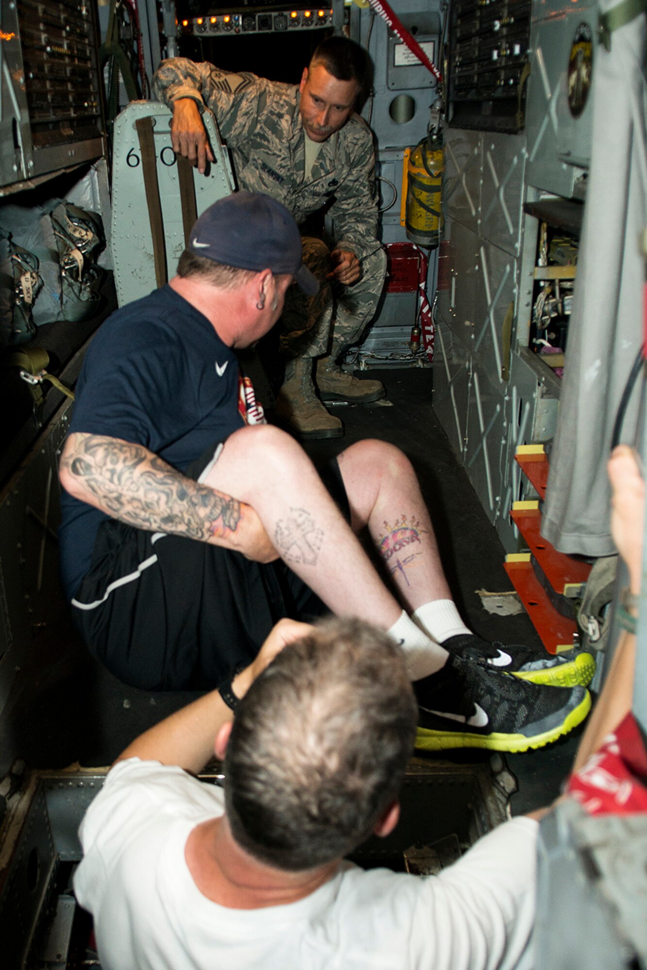 Patrick McDonald makes his way to the pilot's seat of a 307th Bomb Wing B-52H Stratofortress during a tour, June 4, 2014, Barksdale Air Force Base, La. McDonald, a U.S. Army veteran, was paralyzed in 1991 as the result of an accident while serving with the Army in South Korea, joined the American300 Tours to share his experience with fellow military service members as part of the tour's 'Never Quit Series'. (U.S. Air Force photo by Master Sgt. Greg Steele/Released)