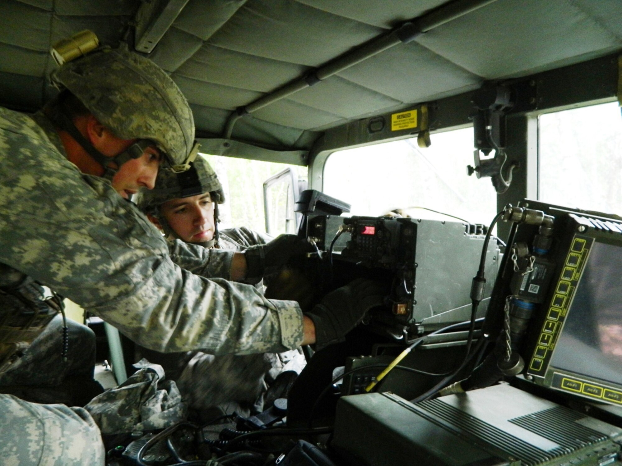 Paratroopers with the 1st Squadron, 40th Cavalry Regiment, work to setup a VRC-90
radio during the unit’s spur ride May 27 at Joint Base Elmendorf-Richardson. The paratroopers completed the spur ride to earn the highly coveted Silver Spurs. The spurs are earned by cavalrymen who complete rigorous physical and mental tests based on cavalry tasks, history and tradition. (U.S. Army photo/Capt. John Orendorff)
