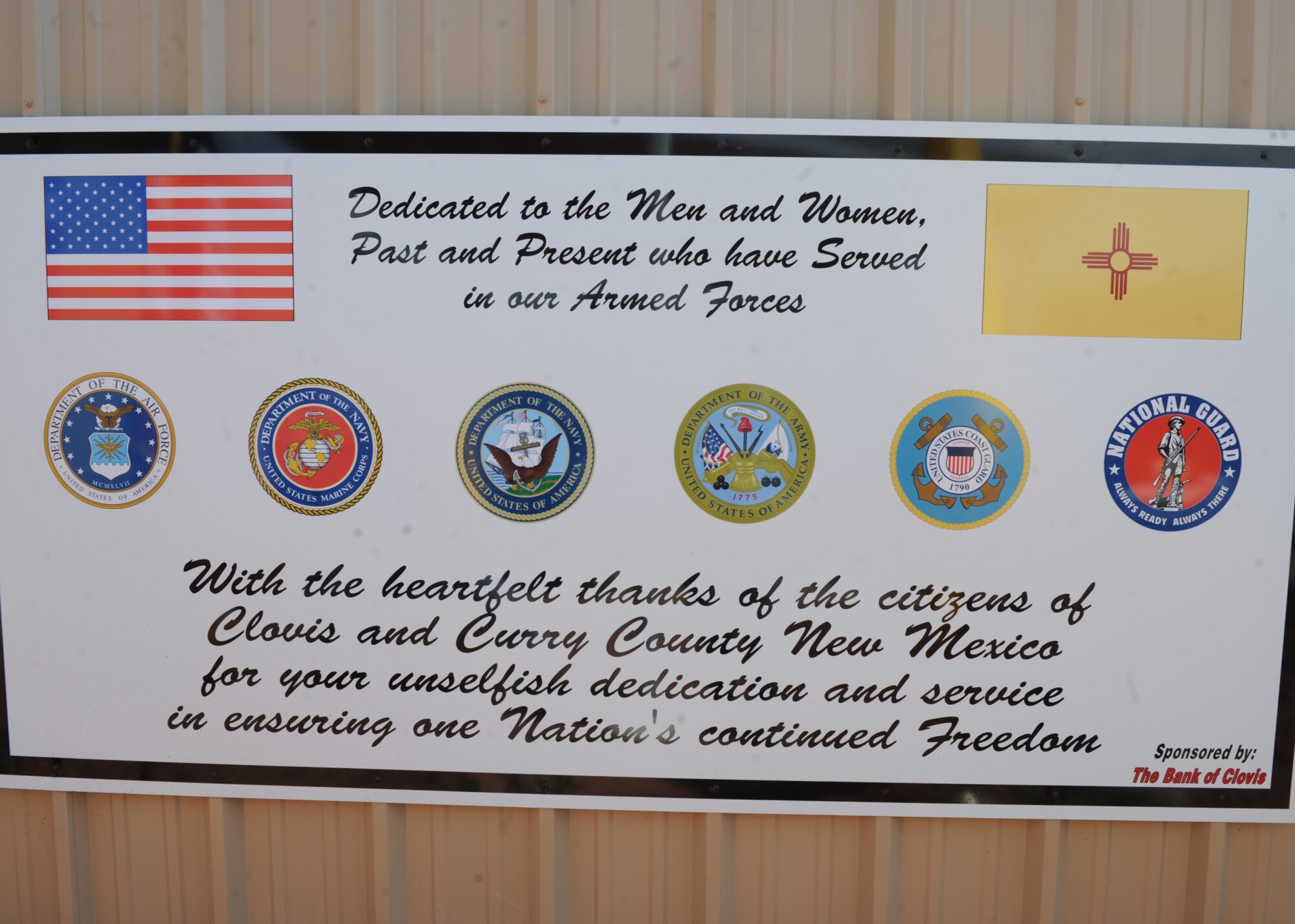A sign is displayed at the dedication of the Veteran’s Rose Garden Memorial on May 29, 2014 at the Hillcrest Park Zoo Clovis, N.M.  The memorial was constructed by 17-year-old Trystan Harpold, Troop 226 member, as a thank you to all those who have served in the U.S. Armed Forces. (U.S. Air Force photo/Senior Airman Ericka Engblom)