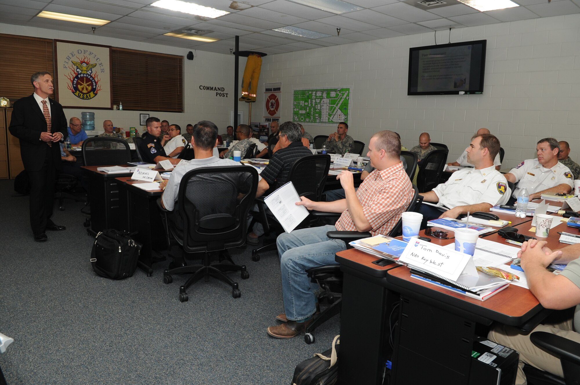 GOODFELLOW AIR FORCE BASE, Texas -- Ernst R. Piercy, Commission on Fire Accreditation International technical advisor and workshop instructor, trains Defense Department firefighters during a three-day Self-Assessment and Standards of Cover Workshop at the Louis F. Garland DOD Fire Academy here May 28. The workshop is a mandatory requirement for any person slated to be an organization’s accreditation manager and is administered by the CFAI. (U.S. Air Force photo/ Staff Sgt. Laura R. McFarlane)