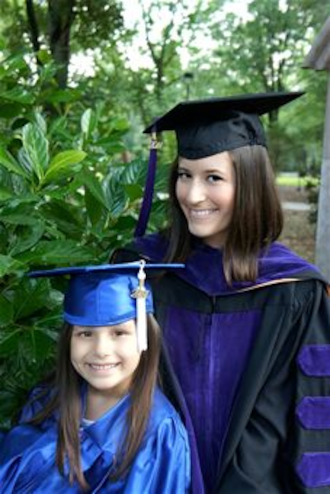 Brittany Smith and Alexis, her daughter, graduate from law school and preschool, respectively. Smith will later joined the Air National Guard as an avionics systems enlisted Airman. (courtesy photo)