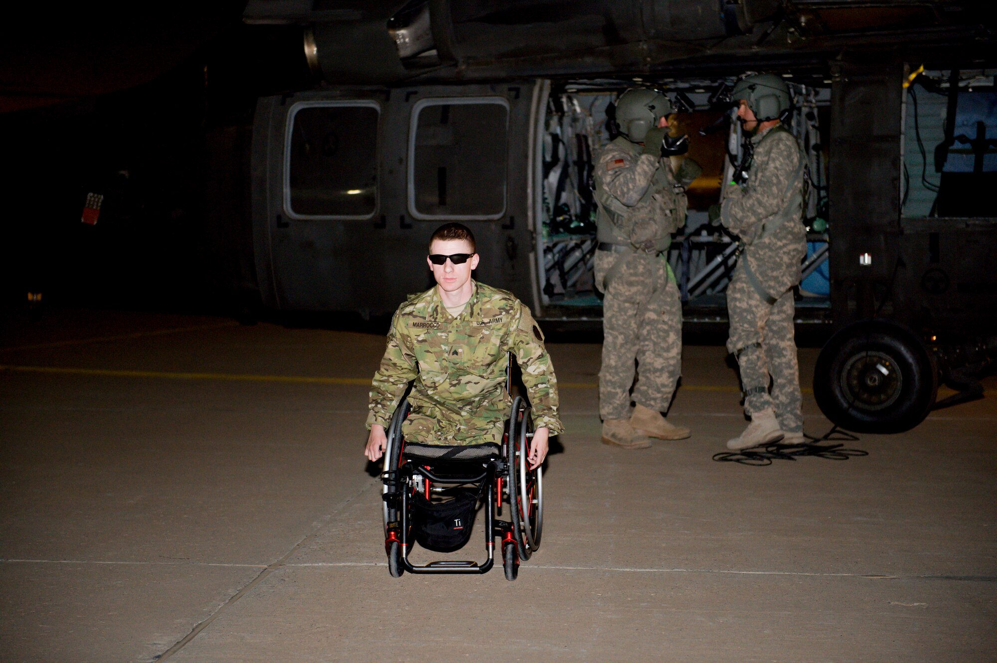 Retired U.S. Army Sgt. Brendan Marrocco, arrives at an undisclosed location in Southwest Asia May 28, 2014 as a part of Operation Proper Exit, which has enabled him and five other wounded warriors the opportunity to obtain closure and to aid in their recoveries from injuries, internal and external, sustained on the battlefield by traveling to Afghanistan. Marrocco was welcomed by 386th Air Expeditionary Wing leadership and Tech. Sgt. Sarah Gann, 386th AEW protocol office. He is from Staten Island, New York and was injured in Baaji, Iraq, April 12, 2009.  He sustained injuries to his left eye and carotid artery and is a quadruple amputee. He is continuing his rehabilitating process at Walter Reed National Military Medical Center from a double arm transplant. (U.S. Air Force photo by Staff Sgt. Jeremy Bowcock)