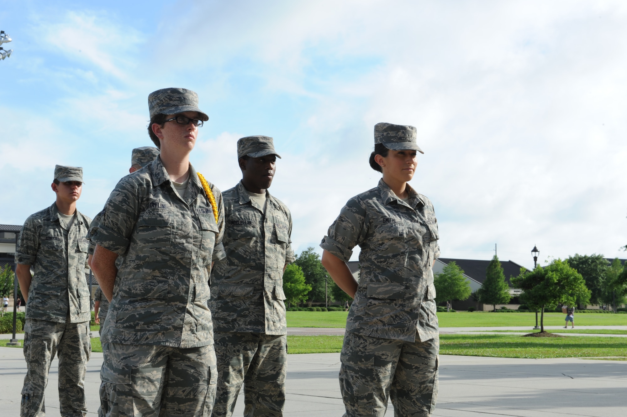 Airman 1st Class Brittany Smith, 81st Training Group student, participates in a practice formation June 3, 2014, in the Triangle, Keesler Air Force Base, Miss. Smith, a licensed attorney and single mother, decided to join the Air National Guard as an avionics systems enlisted Airman in 2013. (U.S. Air Force photo by Airman 1st Class Stephan Coleman)