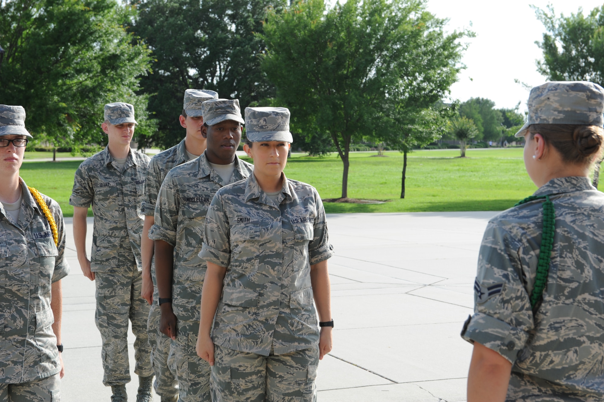 Airman 1st Class Brittany Smith, 81st Training Group student, participates in a practice formation June 3, 2014, in the Triangle, Keesler Air Force Base, Miss. Smith, a licensed attorney and single mother, decided to join the Air National Guard as an avionics systems enlisted Airman in 2013. (U.S. Air Force photo by Airman 1st Class Stephan Coleman)