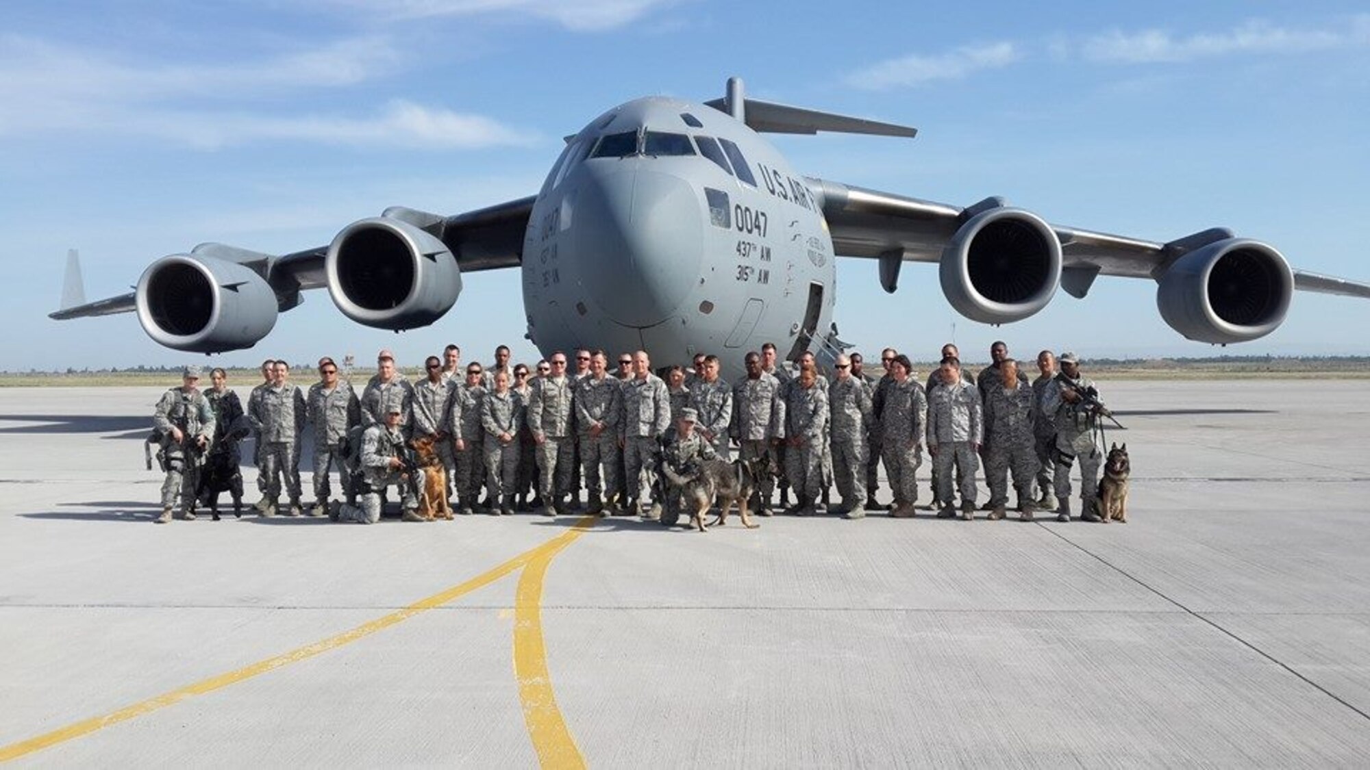 The final remaining Airmen stationed at Transit Center Manas pose for a group photo before departing the base for good. TCM remained operational for more than a decade in support of Operation Enduring Freedom. (Courtesy photo)