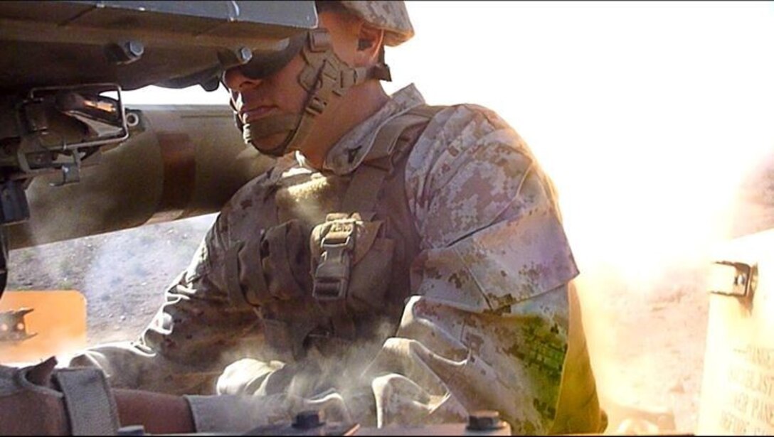 Lance Cpl. Jonathan Hollis, a native of Grand Rapids, Michigan, prepares to fire an anti-tank missile during a training exercise aboard Marine Corps Air Ground Combat Center Twentynine Palms, California. Hollis, an anti-tank missileman with Weapons Company, 1st Battalion, 7th Marine Regiment, is currently deployed to Helmand province, Afghanistan. He earned a combat meritorious promotion to corporal, June 2, 2014.