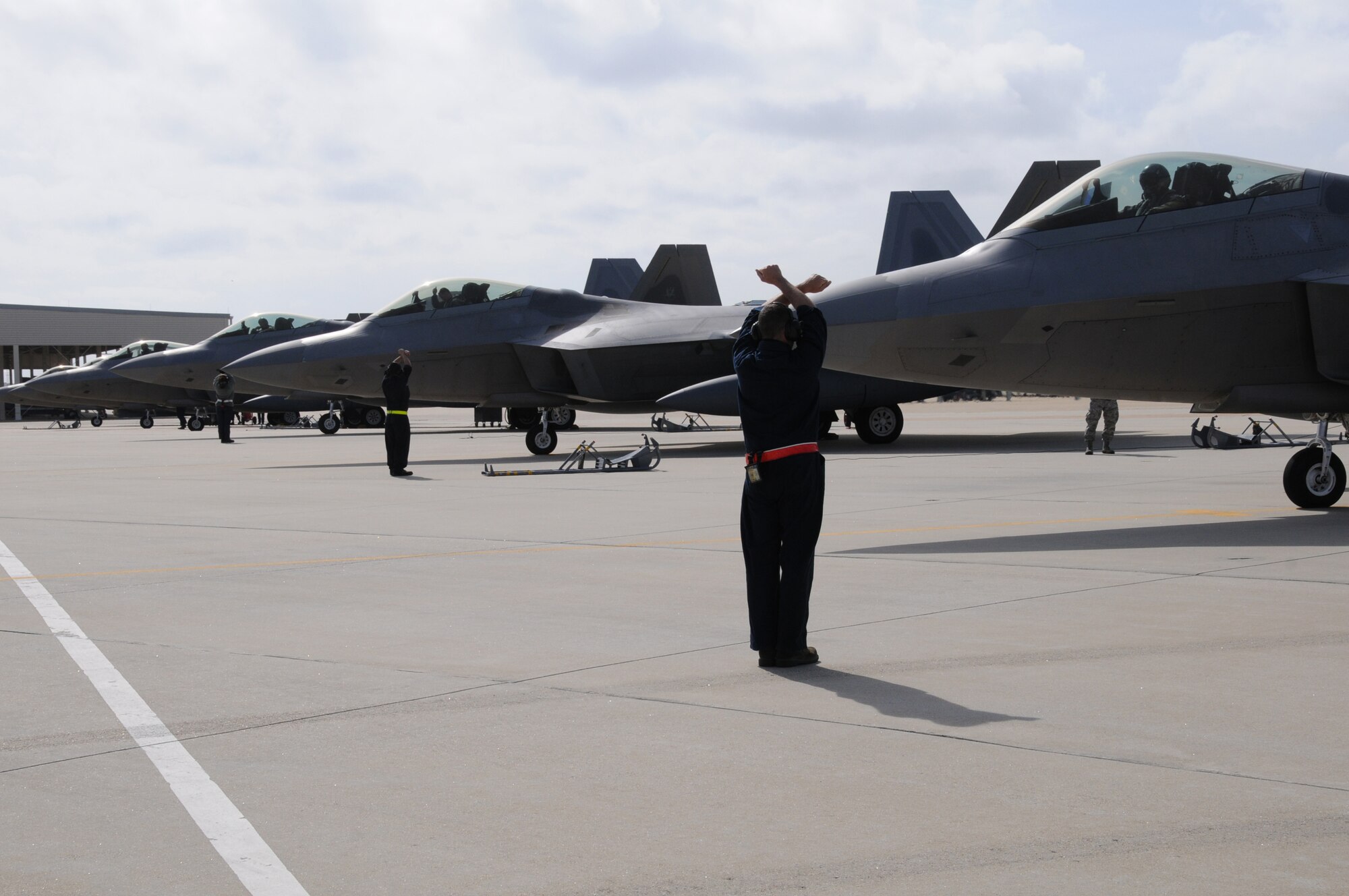 F-22A Raptors flown by 192nd Fighter Wing pilots taxi in to Langley Air Force Base, Va., following nearly a four-month deployment, April 17, 2014.  More than 40 Airmen from the 192nd and 300 from the 1st Fighter Wing Squadron deployed to Kadena Air Base, Japan, to provide stability and security while allowing units to integrate with U.S. and Japanese forces. (U.S. Air National Guard photo by Master Sgt. Carlos J. Claudio/Released)