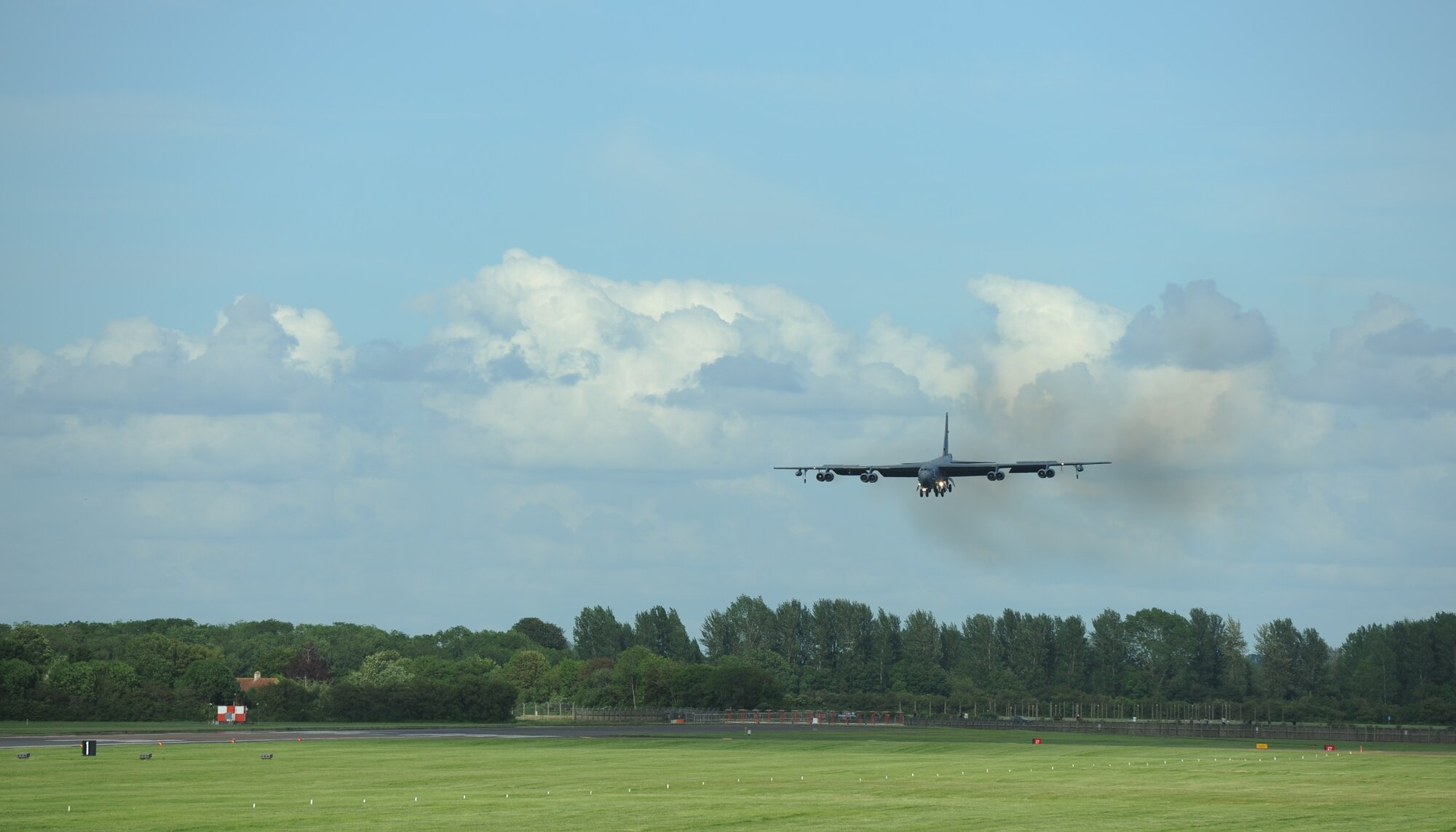A B-52 Stratofortress from Air Force Global Strike Command lands at Royal Air Force Base Fairford, United Kingdom, June 7, 2014. Seventy years ago, Eighth Air Force supported a planned Allied invasion at Normandy with strategic heavy bombers and fighters during D-Day on June 6, 1944. The B-52 flew over Normandy to honor those Service members who fought and gave the ultimate sacrifice that day. (U.S. Air Force photo by Staff Sgt. Nick Wilson/Released)