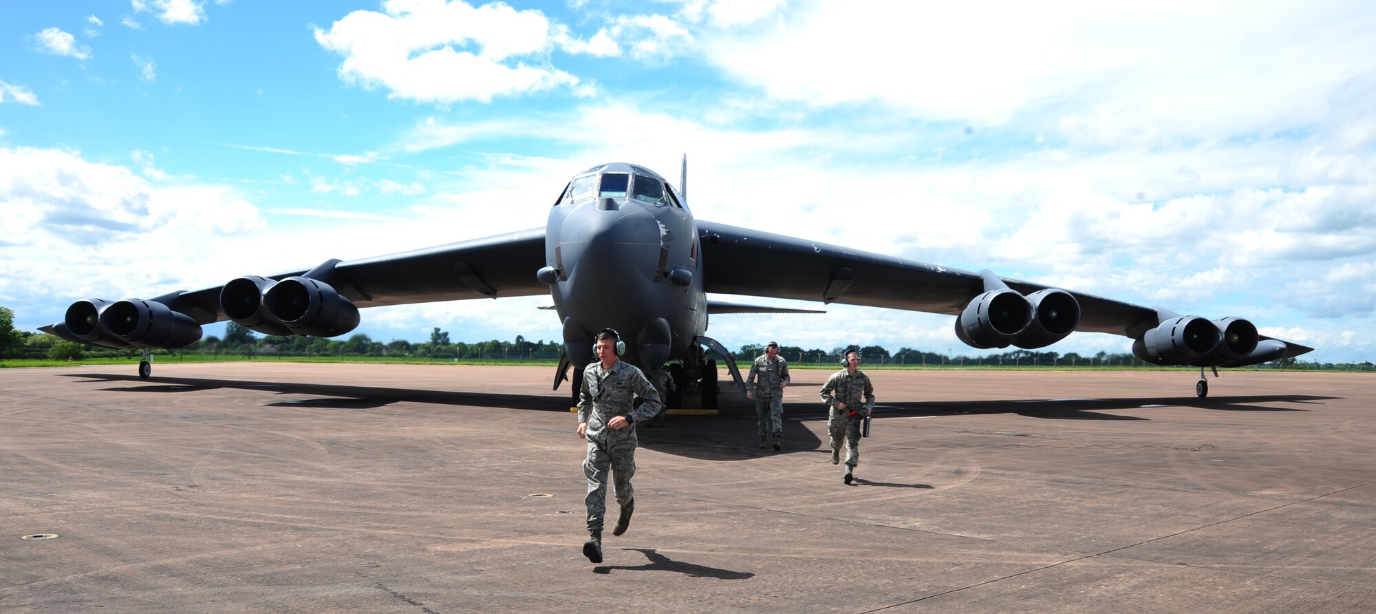 B-52 Stratofortress crew chiefs from Air Force Global Strike Command, Barksdale Air Force Base, La., perform pre-flight checks at Royal Air Force Base Fairford, United Kingdom, June 7, 2014. The B-52 Stratofortress is a long-range, heavy bomber that can perform a variety of missions. The bomber is capable of flying at high subsonic speeds at altitudes up to 50,000 feet. (U.S. Air Force photo by Staff Sgt. Nick Wilson/Released)