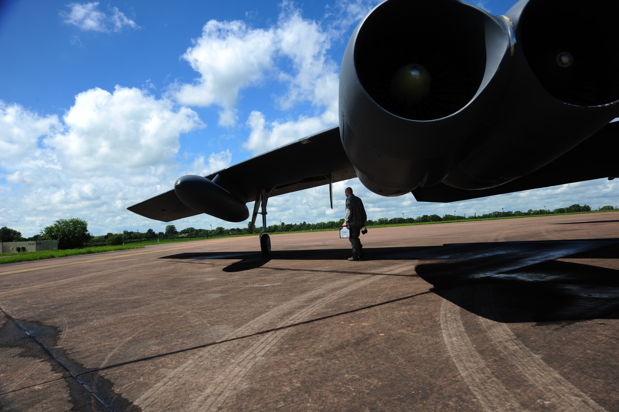 Staff Sgt. Wesley Beard, 2nd Maintenance Squadron crew chief, Minot Air Force Base, N.D., perform a visual inspection on the tail of a B-52 at Royal Air Force Base Fairford, United Kingdom, June 7, 2014. The B-52 Stratofortress is a long-range, heavy bomber that can perform a variety of missions. The bomber is capable of flying at high subsonic speeds at altitudes up to 50,000 feet. (U.S. Air Force photo by Staff Sgt. Nick Wilson/Released)