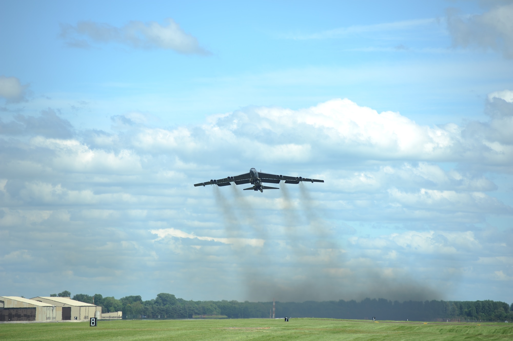 A B-52 Stratofortress from 96th Bomb Squadron, Barksdale Air Force Base, La., takes off at Royal Air Force Base Fairford, United Kingdom, June 7, 2014. Seventy years ago, the Eighth Air Force supported the Allied invasion at Normandy with strategic heavy bombers and fighters during D-Day on June 6, 1944. (U.S. Air Force photo by Staff Sgt. Nick Wilson/Released)