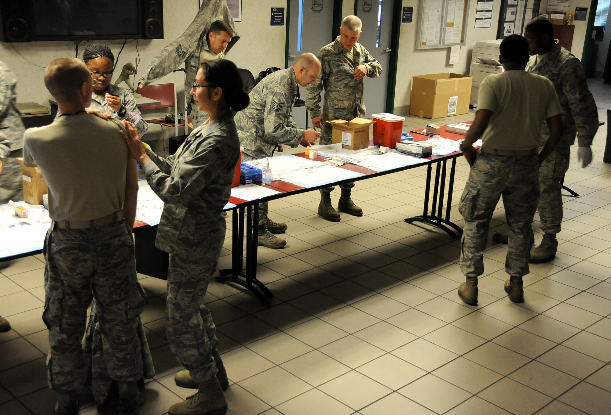 Airmen from the 192nd Fighter Wing receive their vaccines for Hepatitis B at Joint Base Langley-Eustis, April 27, 2014. The 192nd Medical Group conducted the mass vaccination for Hepatitis to ensure airmen are healthy and fit to complete their missions in the Air Guard. (U.S. Air National Guard photo by Airman 1st Class Johnisa B. Roberts/Released)