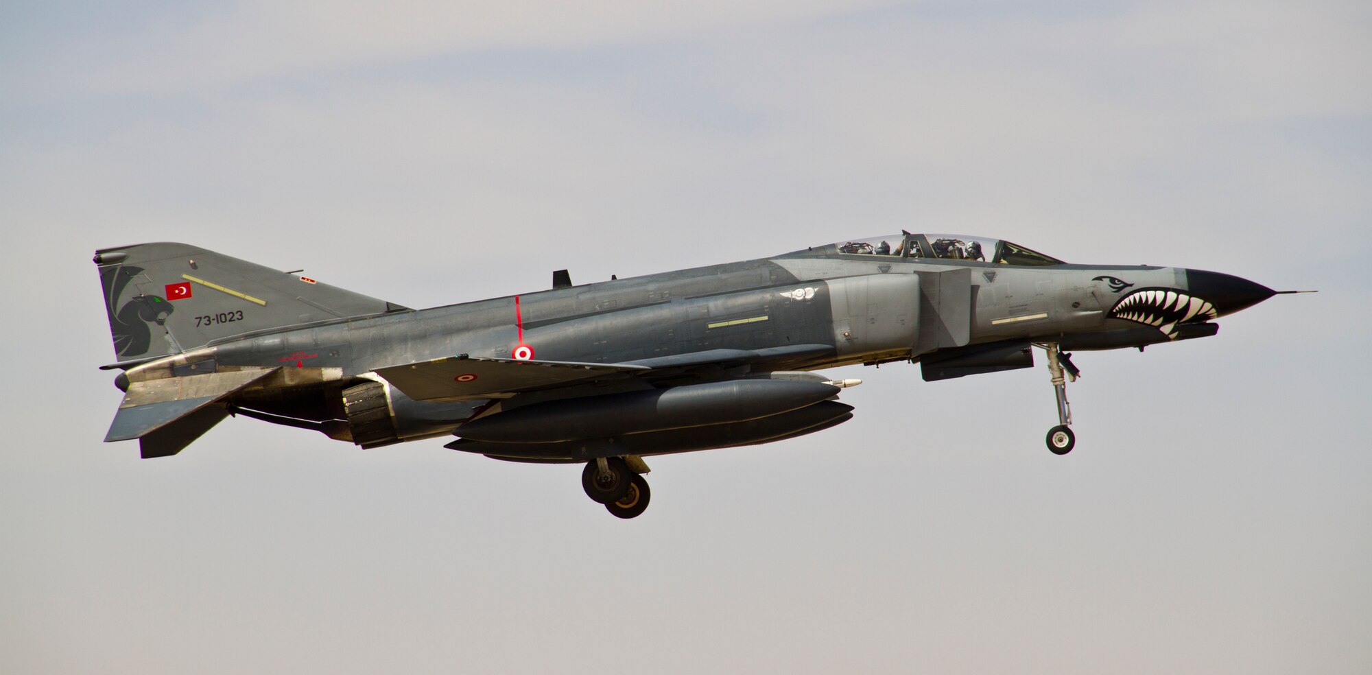 An F-4 Phantom II from the Turkish Air Force flies during a mission at Exercise Eager Lion May 29, 2014, over an air base in northern Jordan. Soldiers, Sailors, Airmen and Marines from more than 20 partner nations came together for two weeks to enhance their interoperability while participating in air-, land- and sea-based scenarios. (U.S. Air Force photo by Staff Sgt. Tyler McLain/Released)