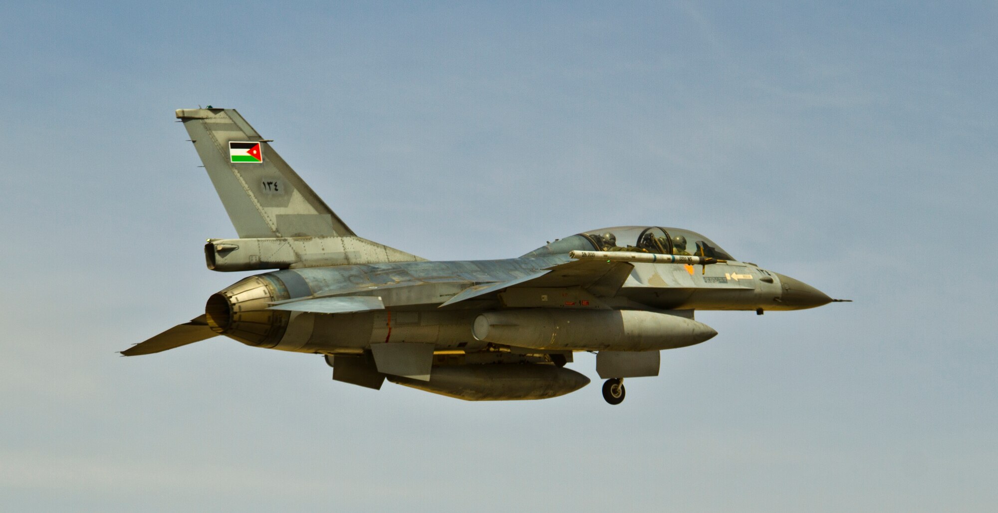 An F-16 Fighting Falcon from the Royal Jordanian Air Force takes to the skies over an air base in northern Jordan May 29, 2014, during Exercise Eager Lion. More than 12,500 personnel from five continents participated in the exercise, which is designed to strengthen military-to-military relationships and interoperability. (U.S. Air Force photo by Staff Sgt. Tyler McLain/Released/)