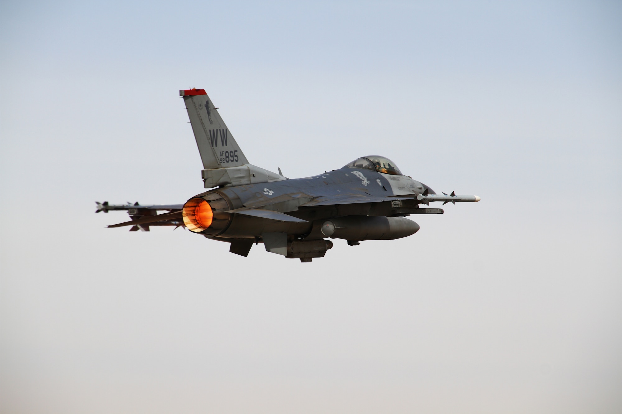 An F-16 Fighting Falcon from the 13th Fighter Squadron at Misawa Air Base, Japan, takes to the skies over an air base in northern Jordan May 29, 2014, during Exercise Eager Lion. Throughout the two-week exercise, Service members from more than 20 partner nations joined together at locations throughout Jordan to build functional capacity, enhance readiness and promote interoperability. (U.S. Air Force photo by Staff Sgt. Tyler McLain/Released)