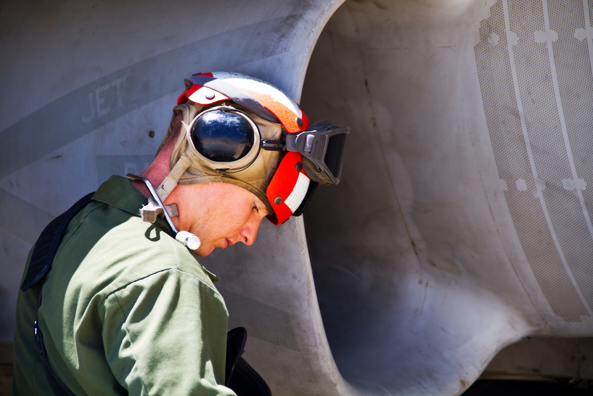 U.S. Marine Corps Cpl. Cody Davis, a maintainer with Marine Fighter Attack Squadron 314 at Marine Corps Air Station Miramar, Calif., does engine maintenance on an F-18 Hornet during Exercise Eager Lion, June 1, 2014, at an air base in northern Jordan. This year, more than 12,500 personnel from more than 20 nations are participating in the exercise, which is designed to strengthen military-to-military relationships and interoperability. (U.S. Air Force photo by Staff Sgt. Tyler McLain/Released)