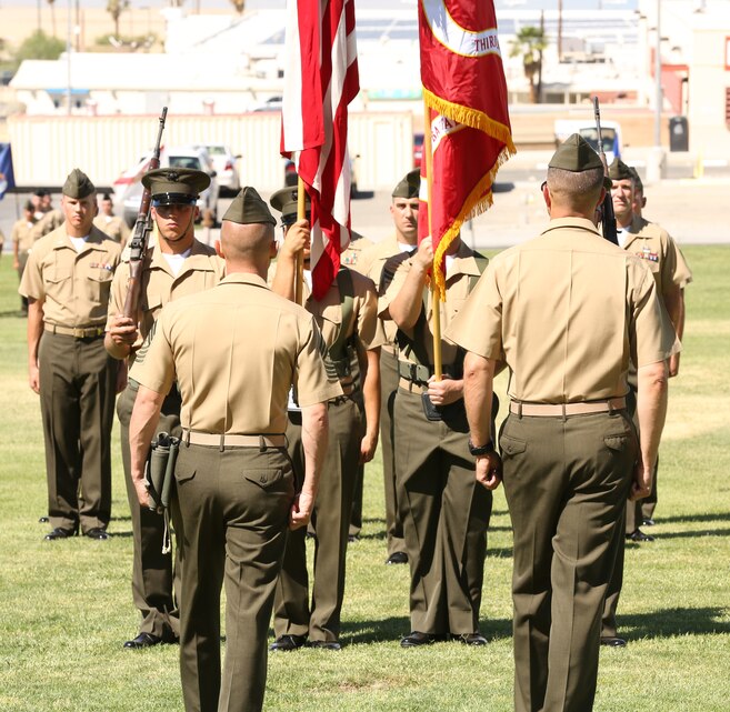 Lt. Col. Jeff Kenney, commanding officer, 3rd Battalion, 4th Marines, 7th Marine Regiment, and Sgt. Maj. Michael Miller, battalion sergeant major, 3/4, prepare to case the battalion's colors during its deactivation ceremony at Lance Cpl. Torrey L. Gray Field, May 30, 2014. The battalion  was the most deployed Marine Corps battalion in the past decade, seeing five deployments to Iraq, one unit deployment program, and three deployments to Afghanistan.