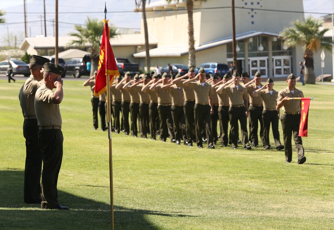 Marines and sailors with 3rd Battalion, 4th Marines, 7th Marine Regiment, conduct pass and review during the battalion's deactivation ceremony at Lance Cpl. Torrey L. Gray Field, May 30, 2014. The ceremony drew a crowd of hundreds, including distinguished Marine Corps guests and veterans that served in the battalion.
