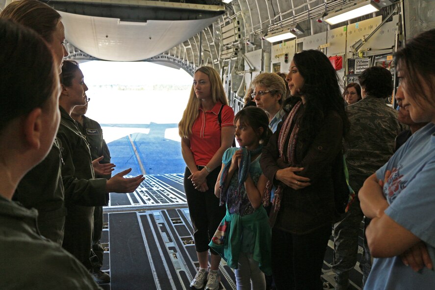 Airmen from the 446th Aeromedical Evacuation Squadron share aspects of their positions as medical technicians and flight nurses with members of the Women in Aviation Washington Chapter during a base tour of McChord Field June 7. The tour allowed members of WIA to learn from and share experiences with the women of the 446th Airlift Wing. (U.S. Air Force Reserve photo by Senior Airman Madelyn McCullough)