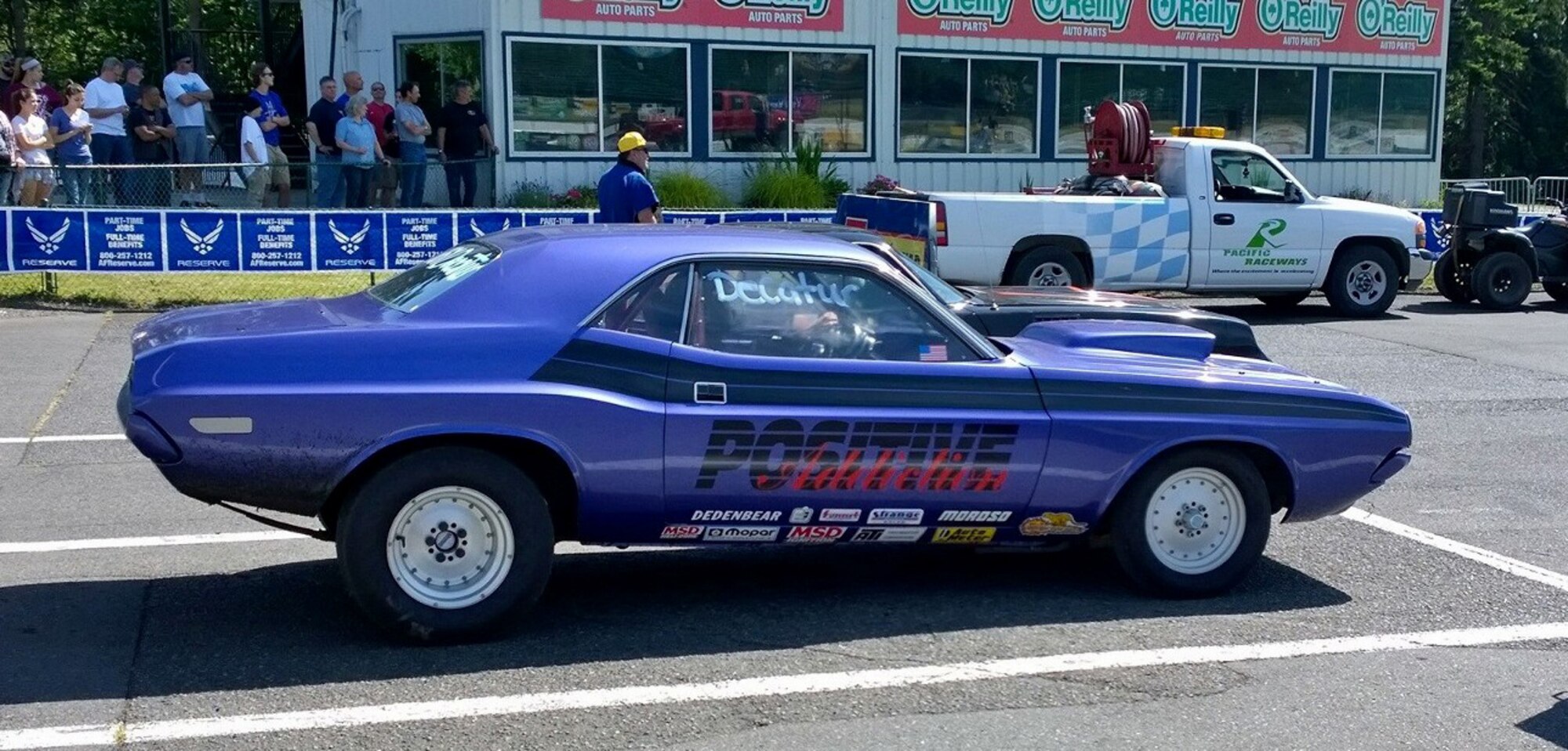 The Air Force Reserve sponsored the National HotRod Association High School Drags the evening of June 6 at Pacific Raceways in Kent, Washington.  High school students and parents in the local community learned about the Air Force Reserve and the 446th Airlift Wing during event. Recruiters garnered 22 new leads after setting up an Air Force Reserve Recruiting booth and posting various banners around the racetrack. (Photo courtesy of Chief Master Sgt. Kristyn Ervin)