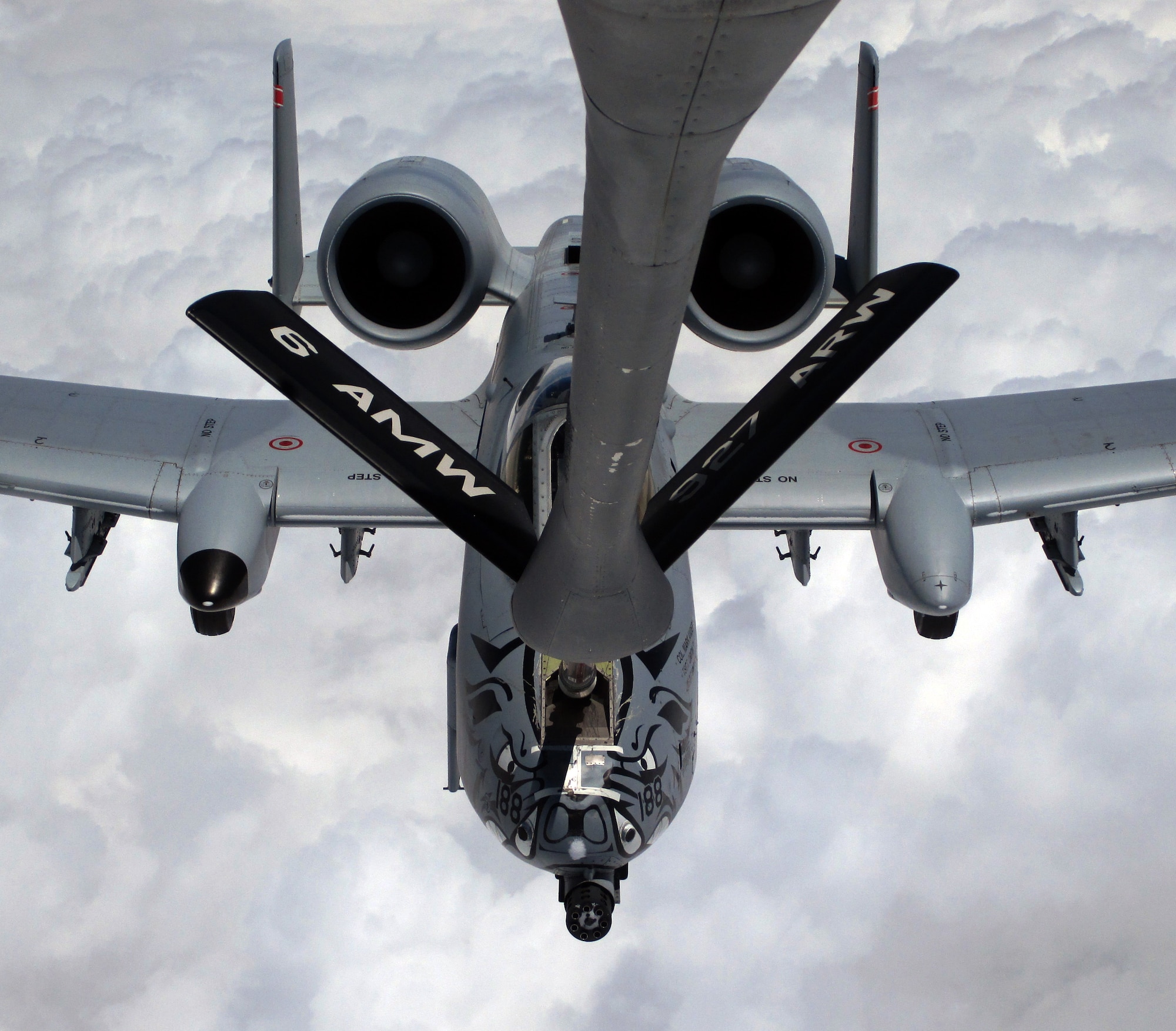 An A-10 Thunderbolt II "Warthog" aircraft from the 188th Fighter Wing, Ebbing Air National Guard Base, Ft. Smith, Ark., is refueled by a KC-135 Stratotanker from McConnell Air Force Base, Kan., operated by a 931st Air Refueling Group aircrew, June 7, 2014.  The fighter was one of the two final A-10s to depart Ft. Smith as the 188th transitions from a fighter mission to an intelligence, reconnaissance and surveillance/remotely piloted aircraft mission.  (U.S. Air Force photos by Senior Airman Sierra Dopfel)