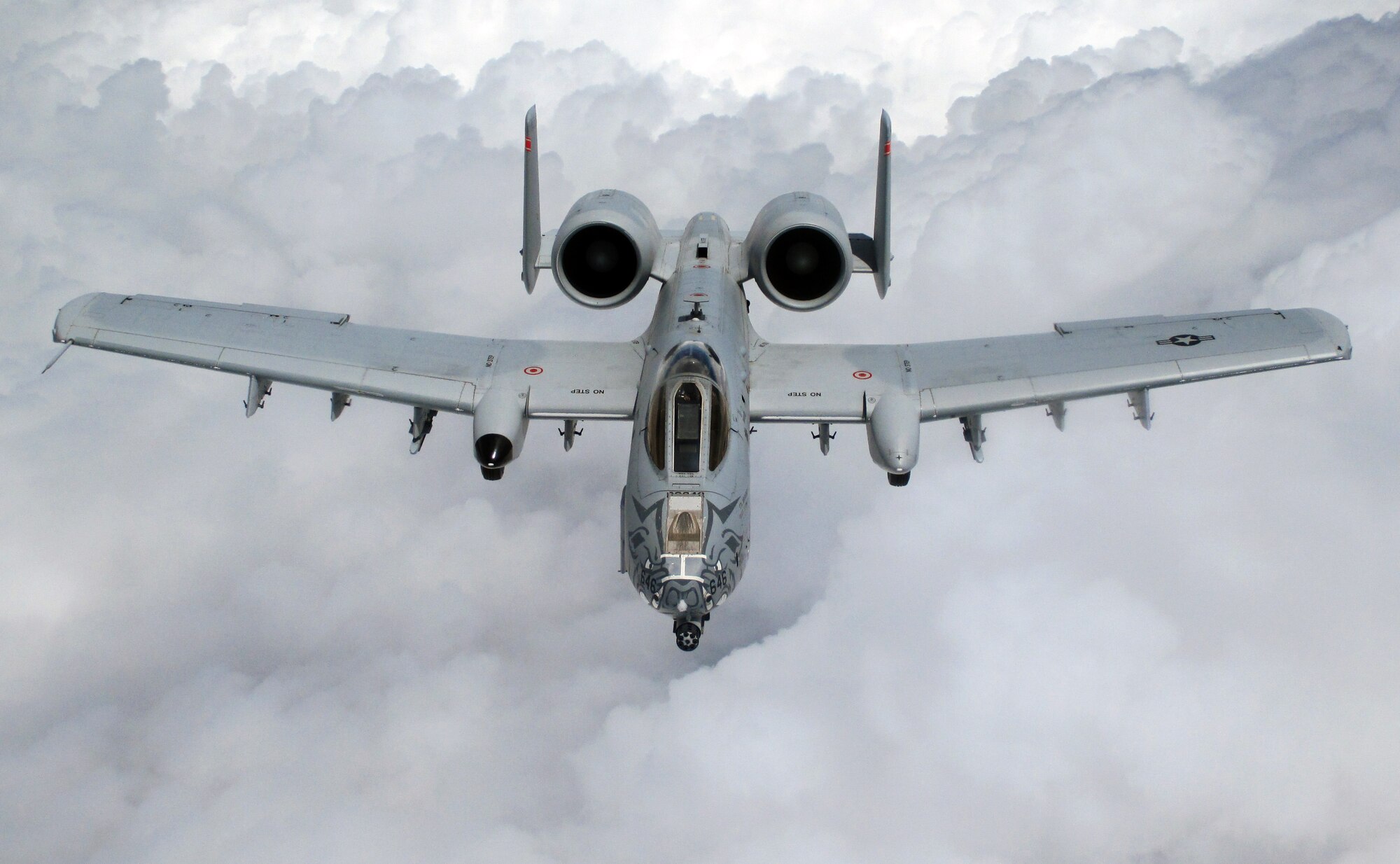 An A-10 Thunderbolt II "Warthog" aircraft from the 188th Fighter Wing, Ebbing Air National Guard Base, Ft. Smith, Ark., flies behind a KC-135 Stratotanker from McConnell Air Force Base, Kan., operated by a 931st Air Refueling Group aircrew, June 7, 2014.  The fighter was one of the final two A-10s to depart Ft. Smith as the 188th transitions from a fighter mission to an intelligence, reconnaissance and surveillance/remotely piloted aircraft mission.  (U.S. Air Force photos by Senior Airman Sierra Dopfel)