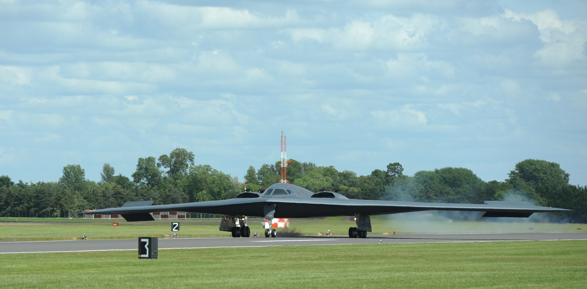 A B-2 Spirit from the 509th Bomb Wing, Whiteman Air Force Base, Mo., lands on the runway at RAF Fairford, England, June 8, 2014. The B-2’s low-observable, or "stealth," characteristics give it the unique ability to penetrate an enemy's most sophisticated defenses and threaten its most valued, and heavily defended, targets. (U.S. Air Force photo by Staff Sgt. Nick Wilson/Released)