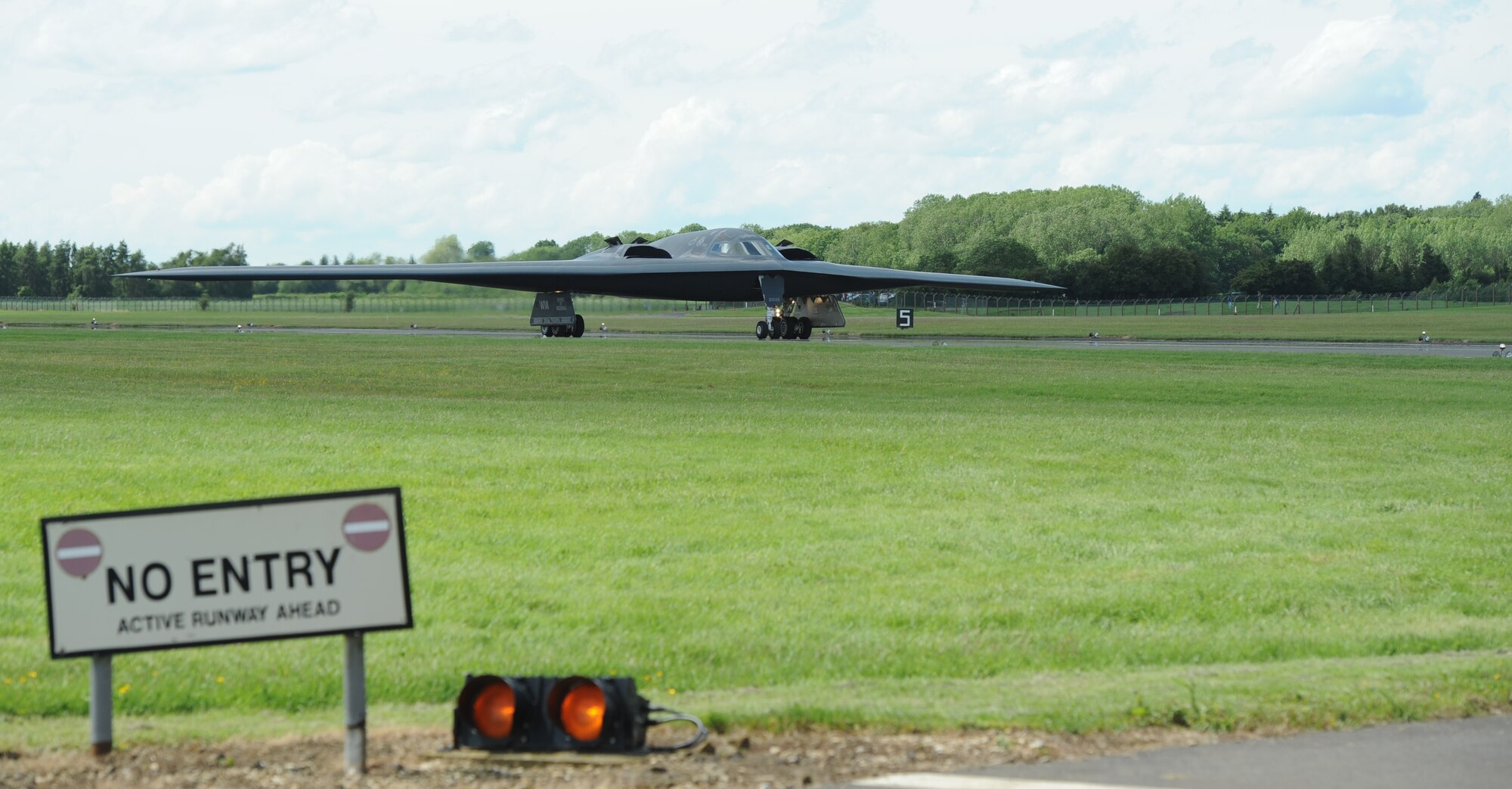 The “Spirit of Indiana,” a B-2 Spirit from Whiteman Air Force Base, Mo., taxis down the runway at RAF Fairford, England, June 8, 2014. The B-2 Spirit is a multi-role bomber capable of delivering both conventional and nuclear munitions. (U.S. Air Force photo by Staff Sgt. Nick Wilson/Released)