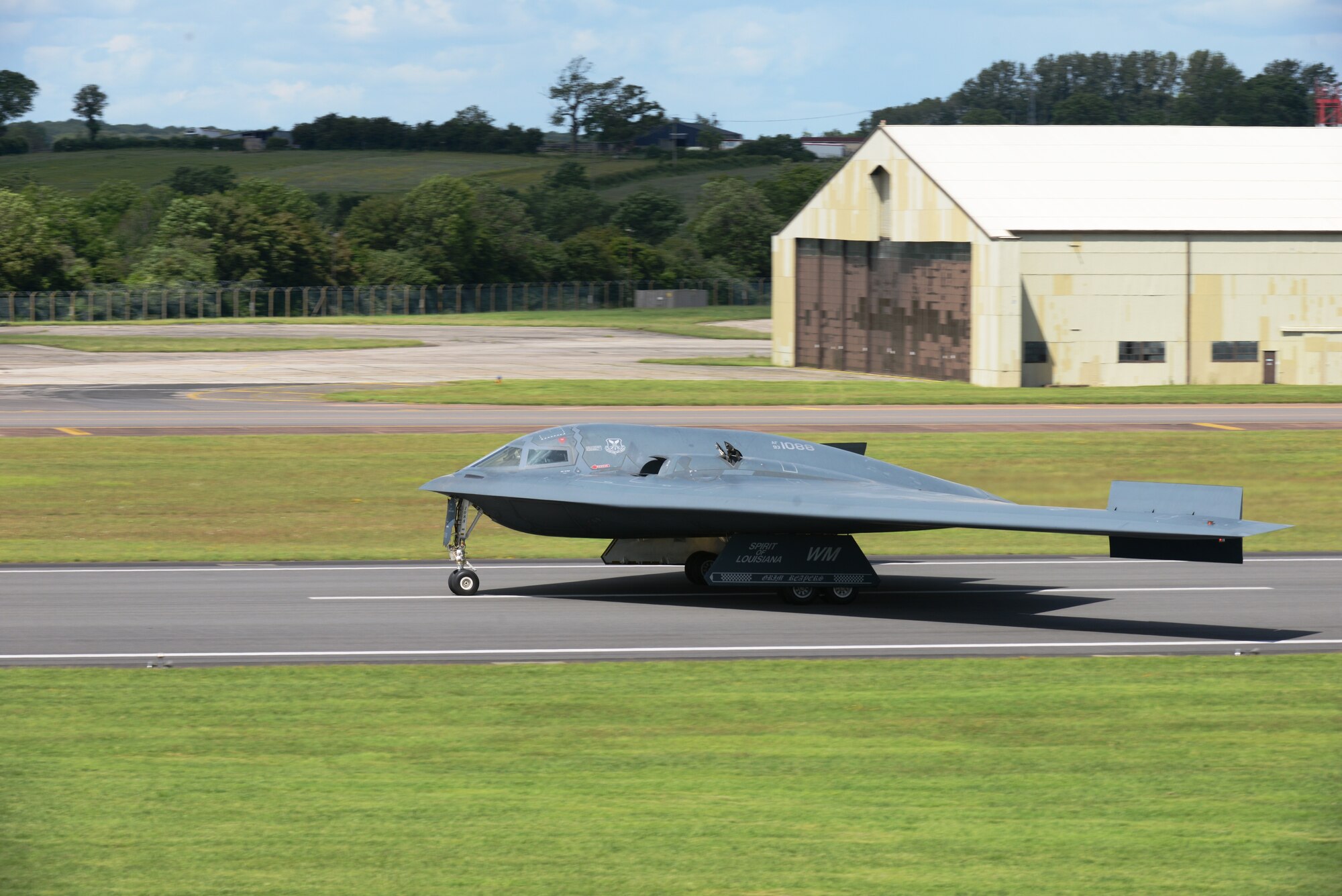 A B-2 Spirit from the 509th Bomb Wing, Whiteman Air Force Base, Mo., lands on the runway at RAF Fairford, England, June 8, 2014. The B-2’s low-observability provides it greater freedom of action at high altitudes, thus increasing its range and a better field of view for the aircraft's sensors. Its unrefueled range is approximately 6,000 nautical miles. (U.S. Air Force photo by Tech. Sgt. Chrissy Best/Released)