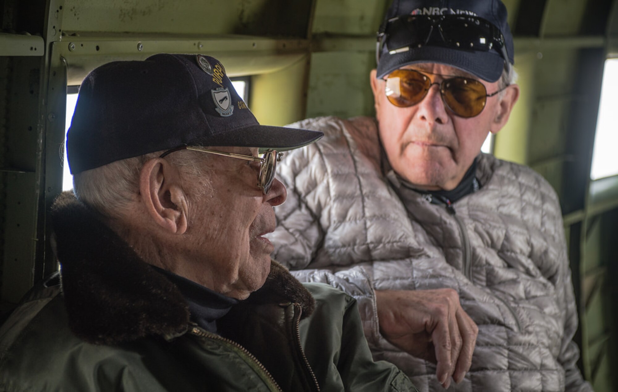 Leslie Cruse, a veteran U.S. Army pilot who flew on D-Day, is interviewed by Tom Brokaw, NBC news broadcaster, during a flight over Normandy inside a C-47 Skytrain that flew during D-Day, June 5, 2014. Prindible was visiting Normandy as part of the 70th Anniversary of the Invasion of Normandy. Over 60 Ramstein Airmen have traveled to Normandy, France to celebrate and honor the sacrifices made by veterans of World War II. (U.S. Air Force photo/Airman 1st Class Jordan Castelan)