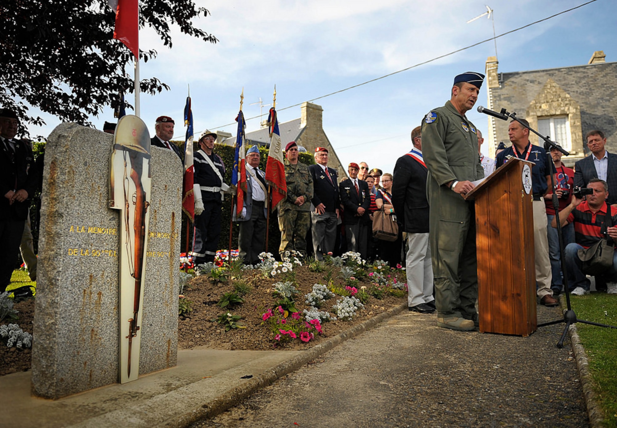Lt. Gen. Tom Jones, USAFE-AFAFRICA vice commander speaks at the Picauville, France D-Day 70th commemoration ceremony June 6, 2014.