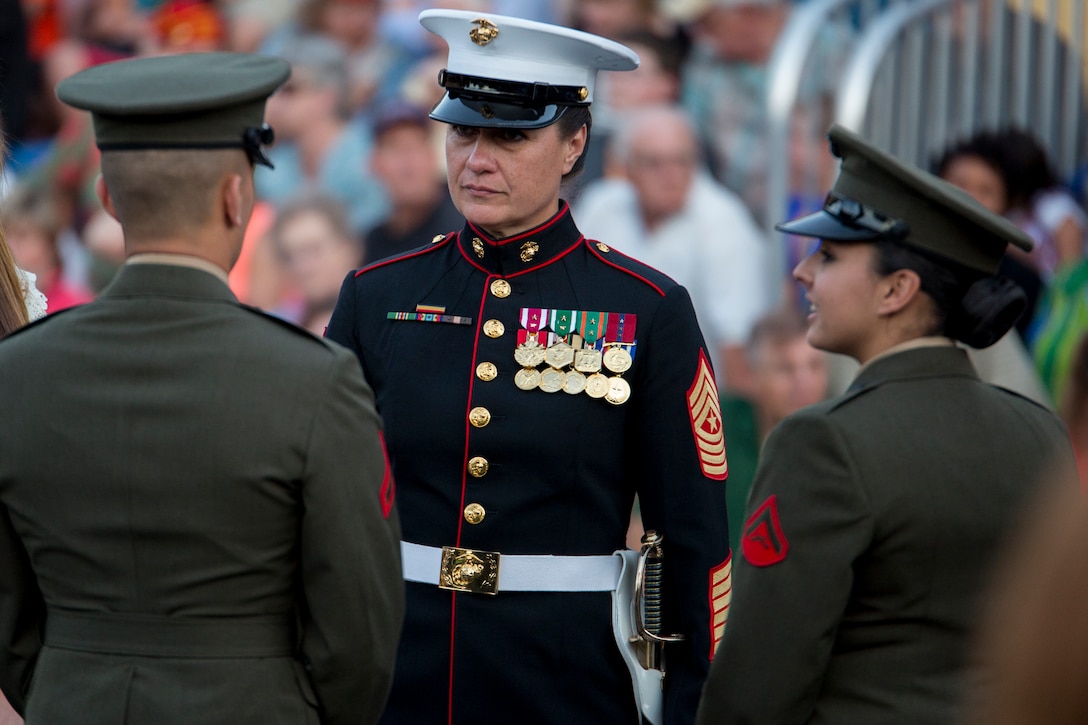 Sgt. Maj. Angela Maness, Marine Barracks Washington sergeant major, talks to Marines prior to a Friday Evening Parade at the Barracks, June 6, 2014. (Official Marine Corps photo by Cpl. Larry Babilya/Released)