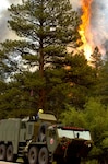 Soldiers from the Colorado Army National Guard's 1157th Engineer Firefighter Company prepare to battle part of the High Park wildfire near Colorado Springs, Colo. The Colorado National Guard has been Soldiers and Airmen to assist with fighting the blaze in a variety of capacities ranging from military police providing site security to aviators dropping fire retardant from helicopters.