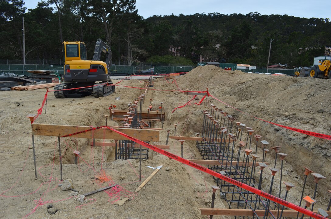 The construction site for the new dining facility at the Presidio of Monterey located in Monterey, Calif., May 8, 2014. The U.S. Army Corps of Engineers Sacramento District broke ground on the new dining facility March 17, 2014, that is designed to feed up to 1300 personnel over a 90 minute period. The facility is one of several major projects at the Presidio of Monterey managed by the Corps and incorporates the latest energy and water conservation technologies in order to operate more efficiently and in a sustainable, environmentally friendly manner.  Read more on the dining facility here: http://bit.ly/presidiodfac. (U.S. Army photo by Capt. Michael N. Meyer/Released)