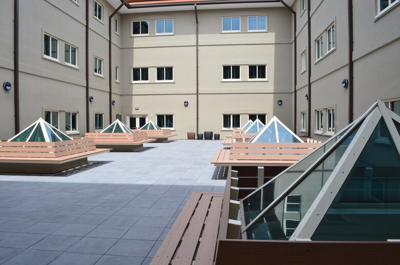 The inner courtyard of the new general instruction building for the Defense Language Institute Foreign Language Center at the Presidio of Monterey in Monterey, Calif., May 8, 2014. The courtyard sits on the roof of the second floor which allows all interior facing rooms to receive sunlight through windows which reduces the use of interior lighting and electricity. The courtyard also features multiple skylights to provide natural lighting to the assembly hall below. All rainwater that lands on the facility is collected in large underground cisterns and will provide non-potable water for toilet-flushing and irrigation needs. The institute is one of several major construction projects at the Presidio managed by the U.S. Army Corps of Engineers Sacramento District and is scheduled to be complete August 2014. The program incorporates the latest energy and water conservation technologies in order to operate more efficiently and in a sustainable, environmentally friendly manner. (U.S. Army photo by Capt. Michael N. Meyer/Released)