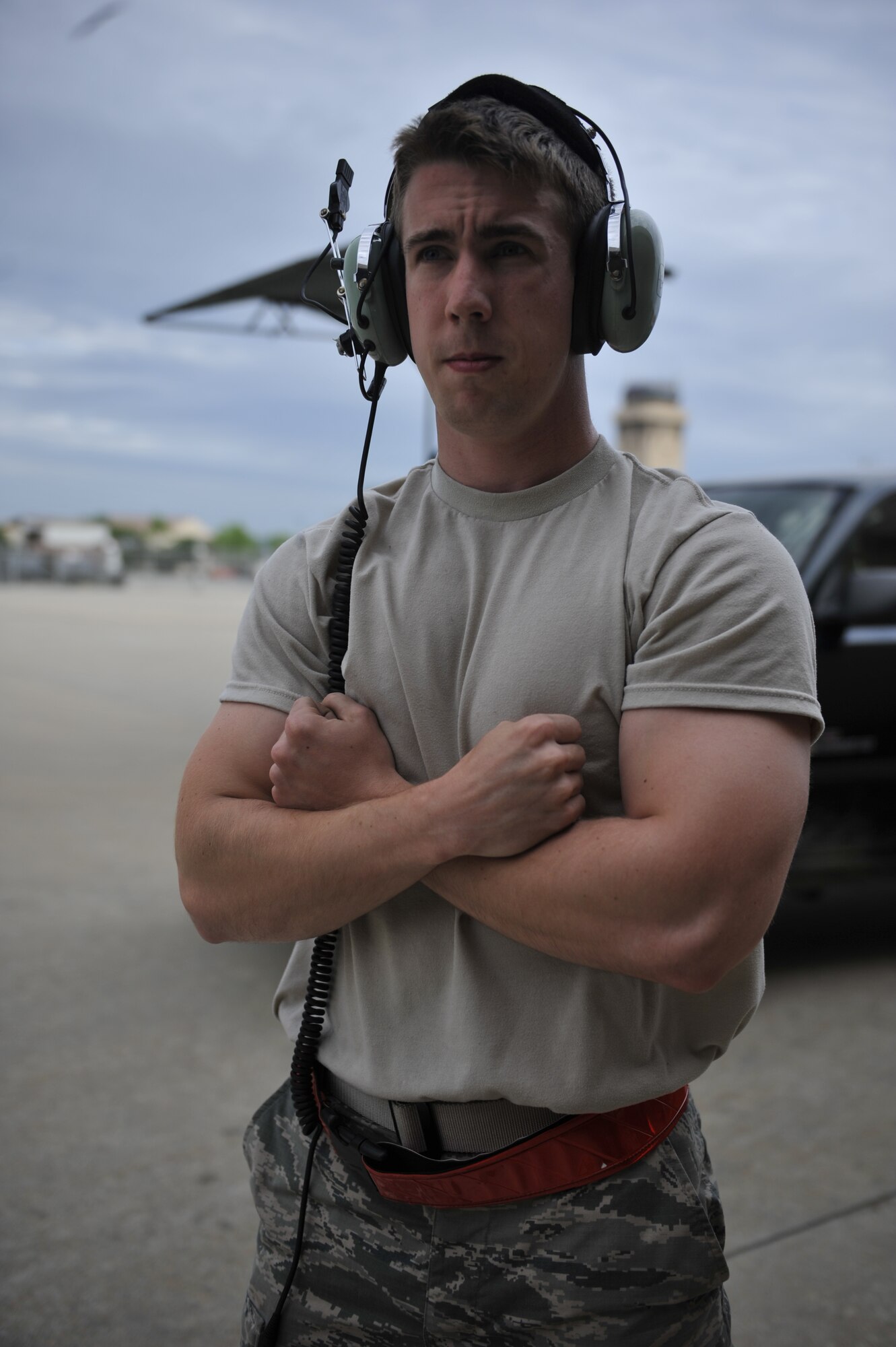Airman 1st Class James Graham, 5th Reconnaissance Squadron crew chief, marshals a U-2 Dragon Lady prior to takeoff on Osan Air Base, Republic of Korea, June 5, 2014. Graham crossed his arms to signal the pilot to hold the brakes. (U.S. Air Force photo/Senior Airman David Owsianka)