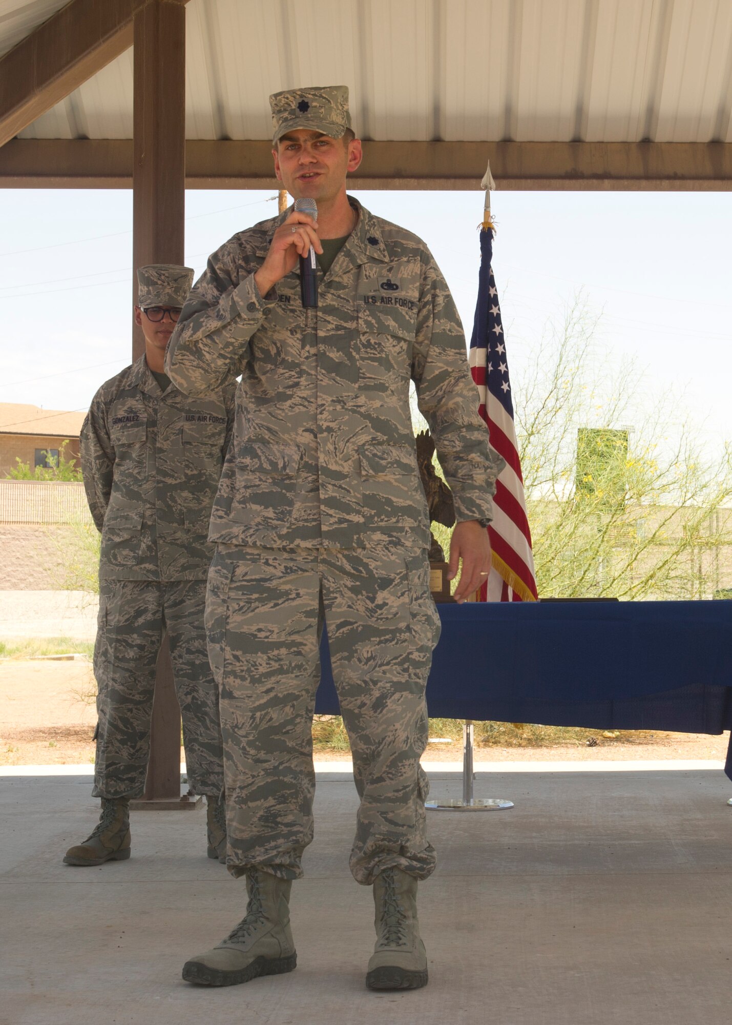 Lt. Col. Robert Bearden, 49th Logistics Readiness Squadron commander, gives thanks to members of Team Holloman after receiving the Daedalion Award during the ceremony at Holloman Air Force Base, N.M., June 6. Holloman’s LRS was once again awarded the title of best LRS in the U.S. Air Force for 2013. The Maj. Gen. Warren R. Carter Logistics Readiness Squadron Effectiveness Award is presented annually by the Order of Daedalions to the base that has achieved the best supply effectiveness record in the U.S. Air Force in support of mission aircraft and weapons. (U.S. Air Force photo by Airman 1st Class Leah Ferrante/Released)