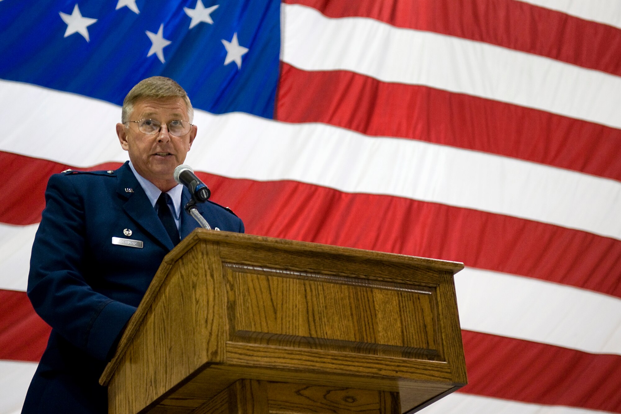 Col. Doug Schwartz, 434th Air Refueling Wing commander, addresses the troops he now commands shortly after taking command of the unit at Grissom Air Reserve, Base, Ind., June 8, 2014. Schwartz told the troops he expected them to always be ready to answer the nation's call, and that he would give 110 percent of himself to that effort. (U.S. Air Force photo/Tech. Sgt. Mark R. W. Orders-Woempner )
