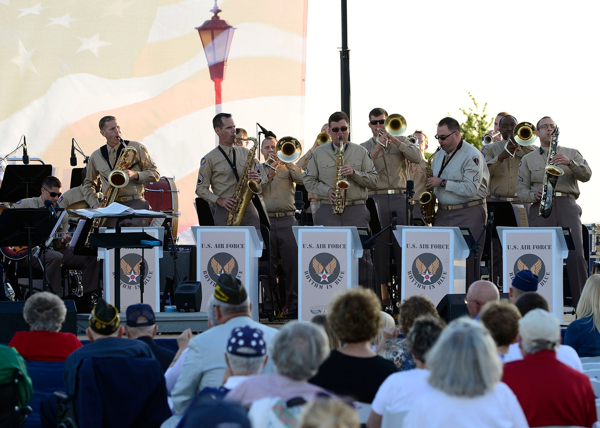 The U.S. Air Force Heritage of America Band performs during the “Turning the Tide” concert, a tribute to the 70th anniversary of D-Day at Fort Monroe Continental Park, Norfolk Va., June 6, 2014. The concert included narratives about what War World II veterans endured and music from the Big Band era. (U.S. Air Force photo by Senior Airman Connor Estes/Released)