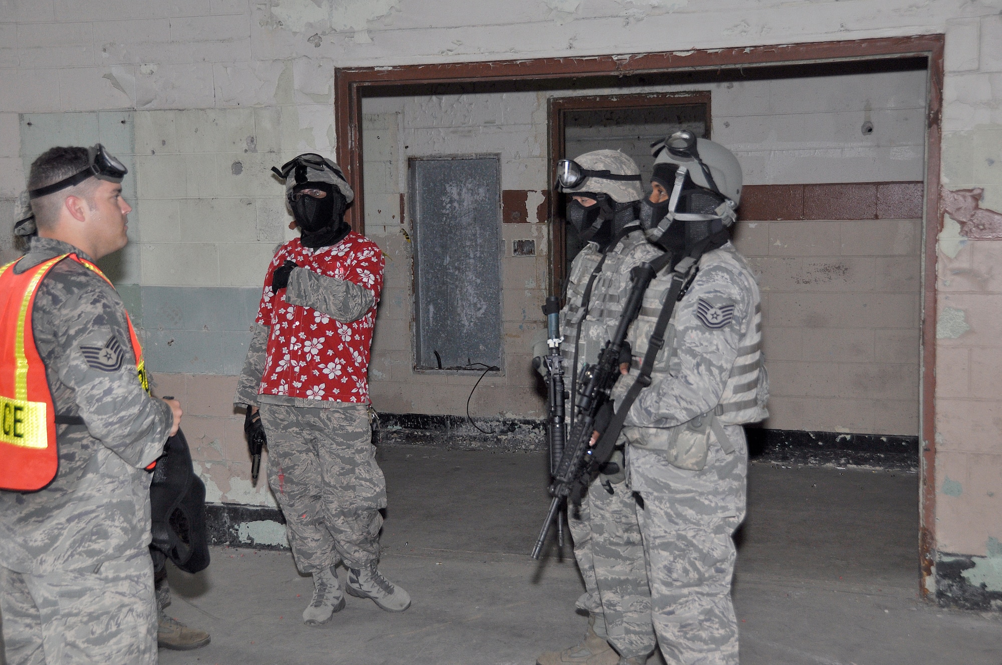 Tech. Sgt. Frederick Kilian, 482nd Security Forces Squadron training manager briefs  members prior to an active shooter training exercise held during the base’s June Unit Training Assembly. (U.S. Air Force photo/Senior Airman Nicholas Caceres)