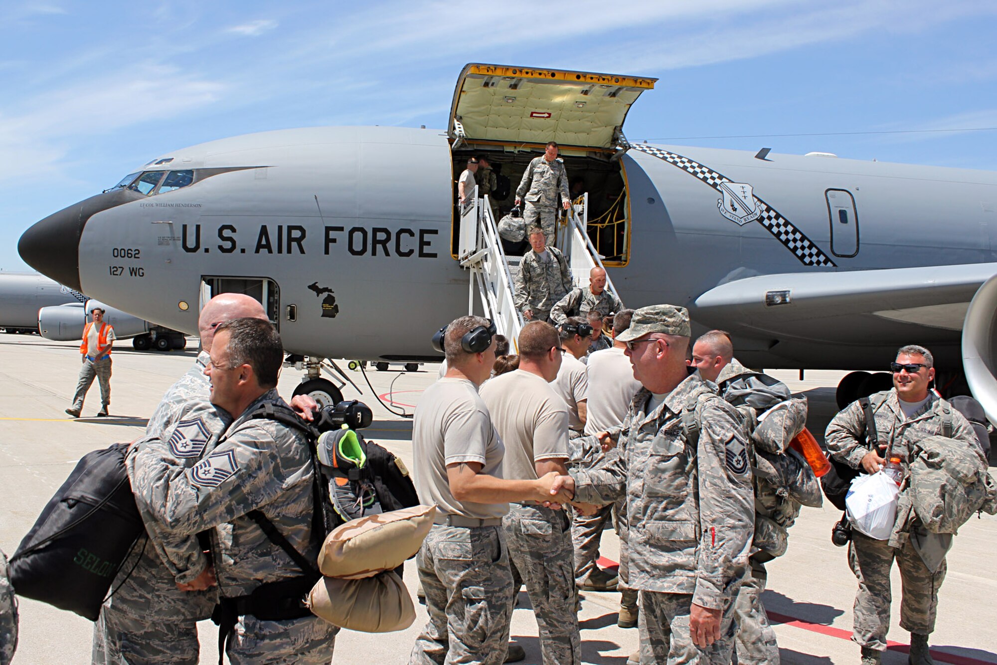 140609-Z-VA676-012 - Airmen of the 127th Air Refueling Group return to their home station of Selfridge AirNational Guard Base, Mich., June 9, 2014, after a deployment to southwest Asia and the Central Command Area of Responsibility. The deployment for the 127th ARG was the last of a three-year-long series of "rolling mobilizations" during which small groups of Selfridge Airmen -- and often one or two KC-135s -- were forward deployed on an ongoing basis. With the conclusion of the rolling mobilizations, the 127th ARG will return to a more traditional Air Expeditionary Force schedule for possible future deployments, meaning more members of the unit will likely deploy if called upon, but will likely deploy less often. (U.S. Air National Guard photo by TSgt. Dan Heaton)