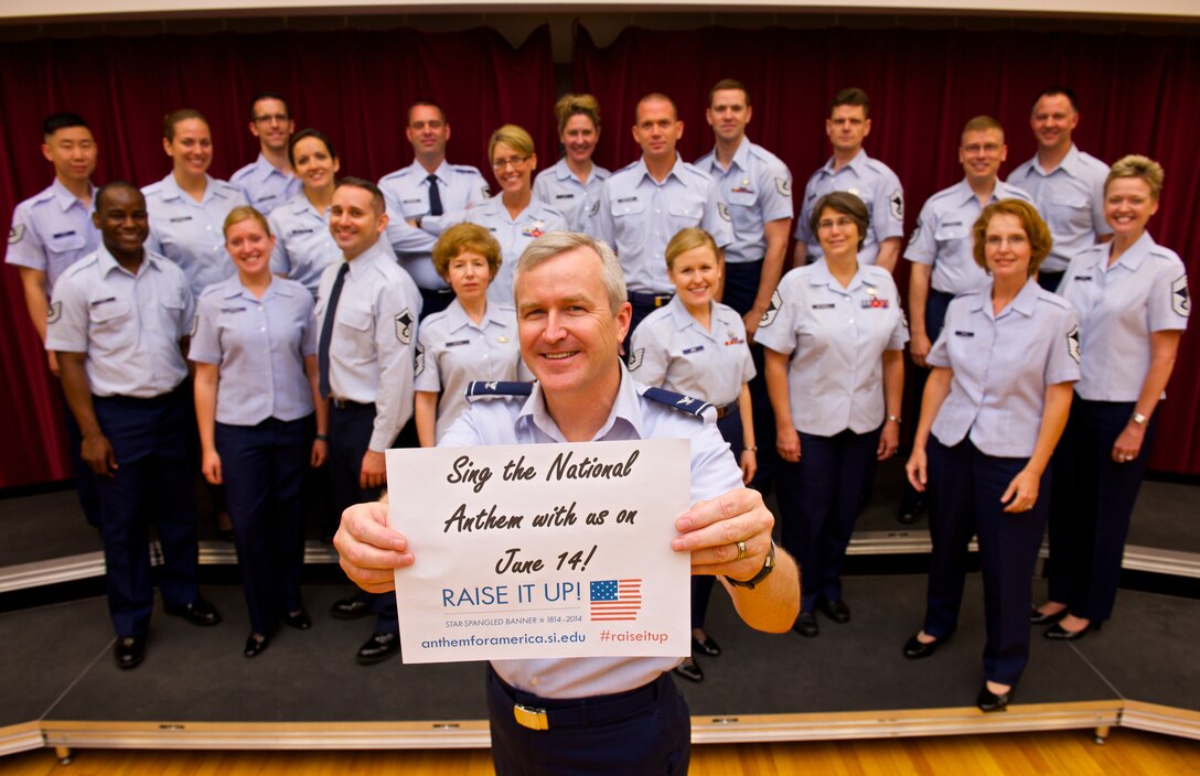 Raise It Up with the Singing Sergeants.  Commander/Conductor of The USAF Band, Col Larry Lang, joins the Singing Sergeants in promoting the 200th Anniversary of the national anthem.  (U.S. Air Force photo/SMSgt Kevin Burns/released)

