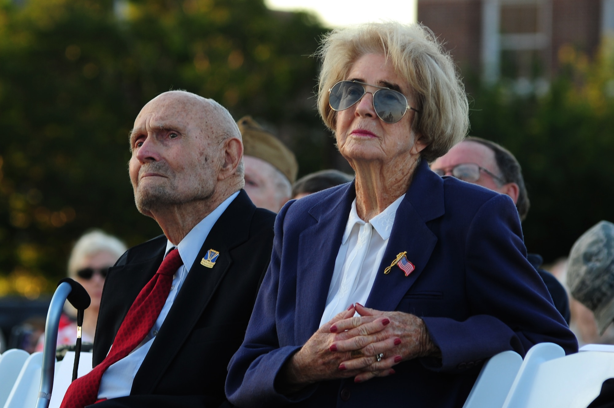 James Ashley, a WWII veteran and his wife listen as the U.S. Air Force Heritage of America Band performs during the “Turning the Tide” concert at Fort Monroe, Va., June 6, 2014. D-Day, or the invasion of Normandy, was the largest seaborne invasion in history. The event began with the incursion of German-occupied Western Europe, led to the restoration of the French Republic and contributed to the Allied victory of War World II. (U.S. Air Force photo by Airman 1st Class Areca T. Wilson/Released)
