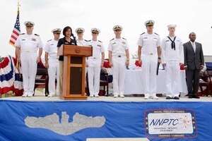 Naval Nuclear Power Training Command staff and guests recognize Ens. Matthew McVay (third from right) and Petty Officer 3rd Class Tyler Rector (second from right) as the officer and enlisted honor graduates at the NNPTC graduation ceremony of class 1402 June 6, 2014, on Joint Base Charleston – Weapons Station, S.C. (US Navy photo/Petty Officer 2nd Class Jason Pastrick)
