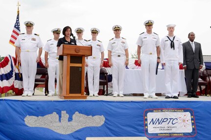 Naval Nuclear Power Training Command staff and guests recognize Ens. Matthew McVay (third from right) and Petty Officer 3rd Class Tyler Rector (second from right) as the officer and enlisted honor graduates at the NNPTC graduation ceremony of class 1402 June 6, 2014, on Joint Base Charleston – Weapons Station, S.C. (US Navy photo/Petty Officer 2nd Class Jason Pastrick)