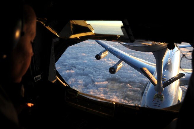 Staff Sgt. Patricia Rich, a boom operator with the 19st Air Refueling Squadron, trains NATO E-3A pilots in air refueling during a flight over Germany in May 2014. (Utah Air National Guard photo by Staff Sgt. Annie Edwards/RELEASED)