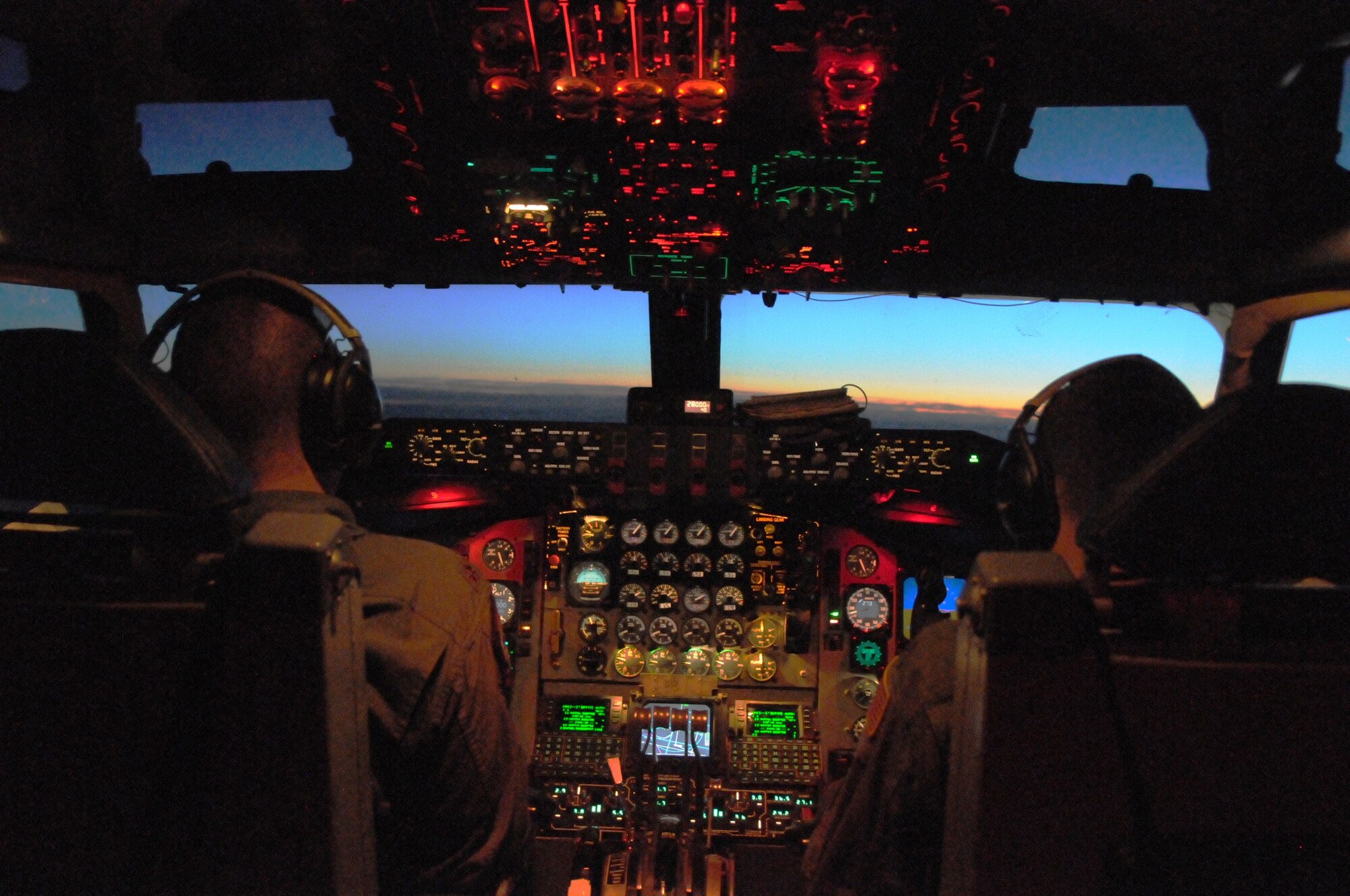 Maj. Jeremy Morrison and Maj. Zachery Love, pilots with the 191st Air Refueling Squadron, fly a KC-135R Stratotanker during a night training exercise over Germany in May 2014. (Utah Air National Guard photo by Staff Sgt. Annie Edwards/RELEASED)