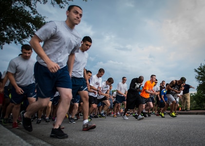 Members of Joint Base Charleston begin the 5K Fitness Challenge Run June 6, 2014, on Joint Base Charleston, S.C. The Fitness Challenge is held monthly to test Team Charleston’s fitness abilities. (U.S. Air Force photo/ Airman 1st Class Clayton Cupit)